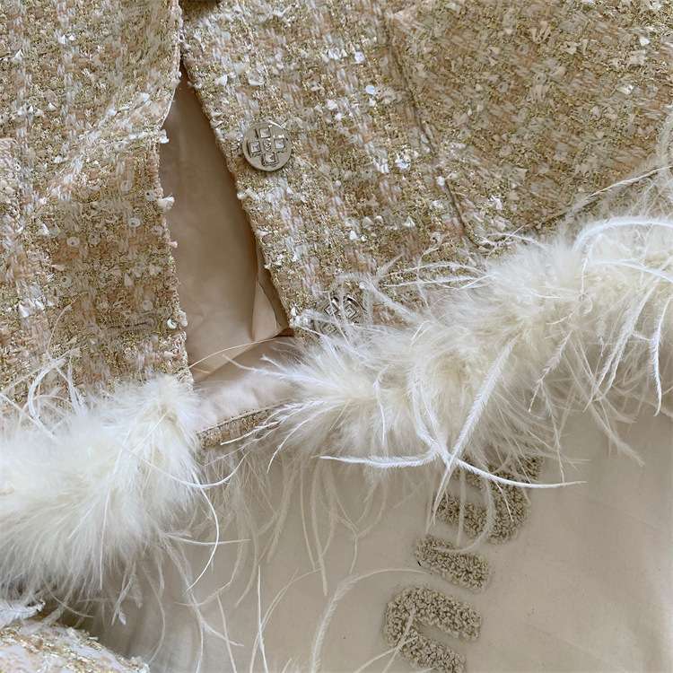 フェザー付きツイードセットアップ